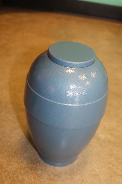 This inexpensive urn comes in a variety of colors and holds 200 cubic in.
